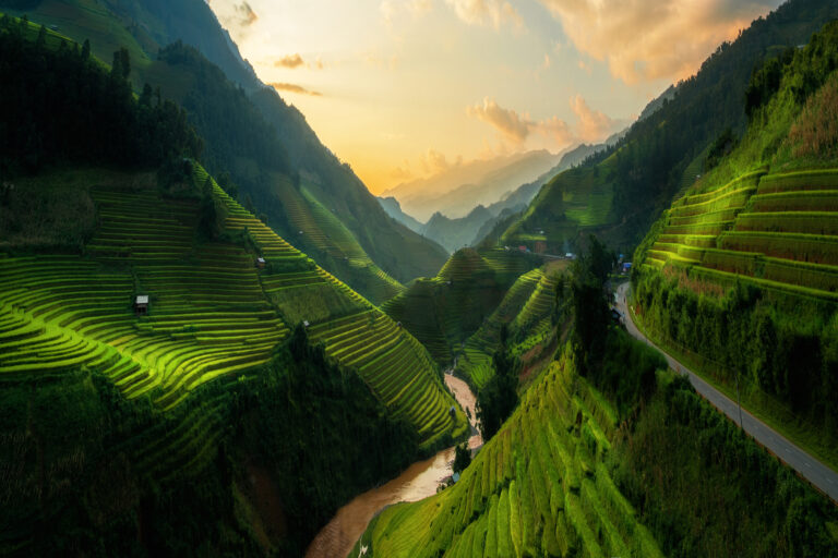 Terraced rice field landscape near Sapa in Vietnam. Mu Cang Chai Rice Terrace Fields stretching across the mountainside, layer by layer reaching up as endless, with about 2,200 hectares of rice terraces, of which 500 hectares of terraces of 3 communes such as La Pan Tan, Che Cu Nha and Ze Xu Phinh.