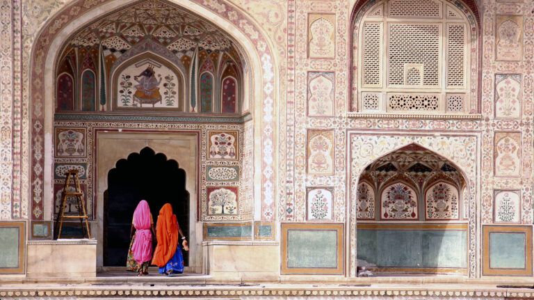 Two women walking in the Amber Fort, Jaipur